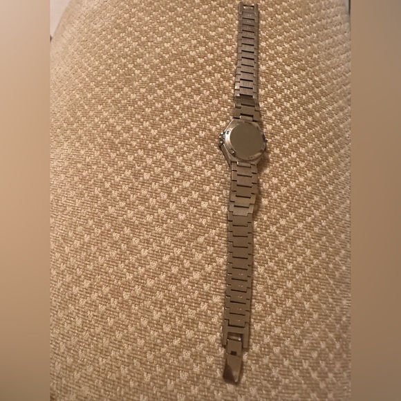 Neiman Marcus Round Round Case with Mother of Pearl Dial and Roman Numerals - Picture 5 of 5